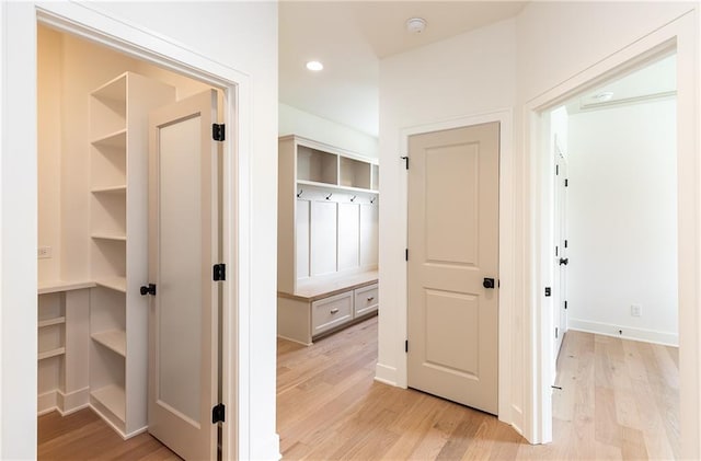 18505 Mohawk Ln, Overland Park, KS 66085 - corridor featuring light wood-type flooring and recessed lighting