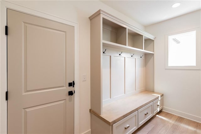 18505 Mohawk Ln, Overland Park, KS 66085 - mudroom featuring light wood finished floors and recessed lighting