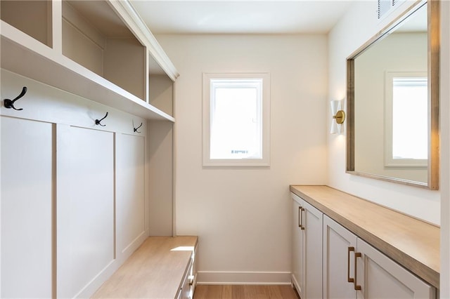 18505 Mohawk Ln, Overland Park, KS 66085 - mudroom with light wood-style flooring and baseboards