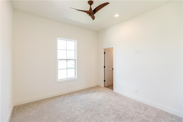 18505 Mohawk Ln, Overland Park, KS 66085 - empty room featuring light colored carpet, a ceiling fan, and recessed lighting