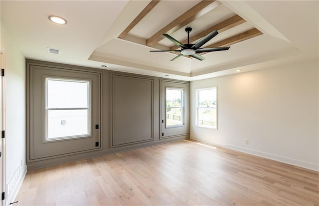 18505 Mohawk Ln, Overland Park, KS 66085 - spare room with a raised ceiling, a ceiling fan, light wood finished floors, recessed lighting, and beam ceiling