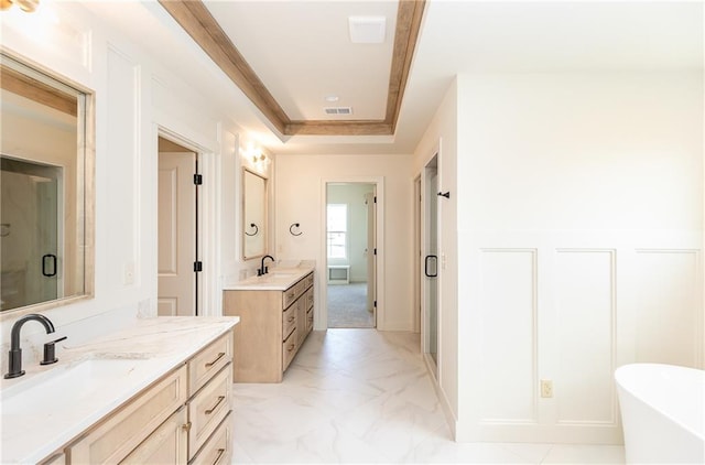 18505 Mohawk Ln, Overland Park, KS 66085 - full bathroom featuring two vanities, a soaking tub, marble look tile flooring, and a stall shower