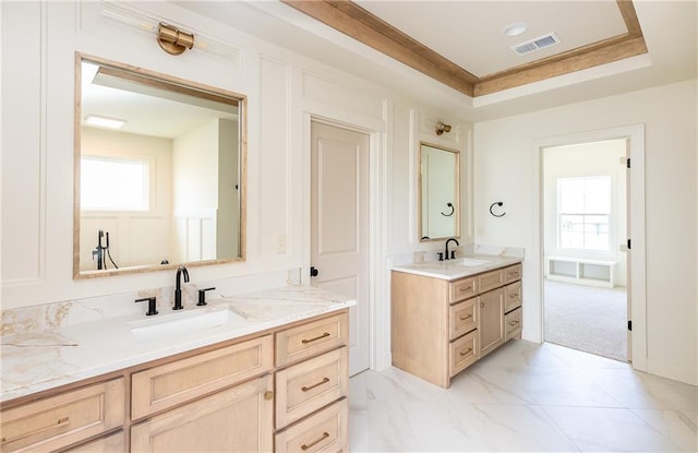 18505 Mohawk Ln, Overland Park, KS 66085 - bathroom featuring plenty of natural light, two vanities, and a raised ceiling