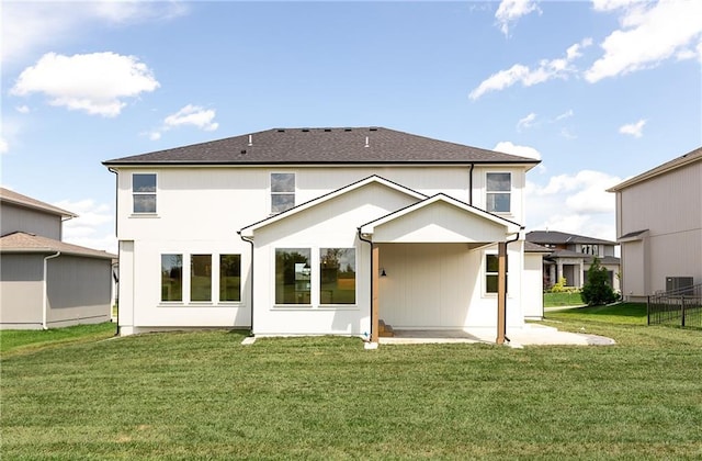 18505 Mohawk Ln, Overland Park, KS 66085 - rear view of property featuring a patio area and roof with shingles