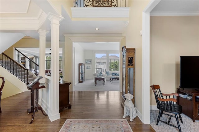 5716 W 146th St, Overland Park, KS 66223 - foyer featuring wood finished floors, ornamental molding, ornate columns, and stairway