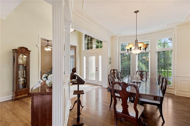 5716 W 146th St, Overland Park, KS 66223 - dining room featuring a chandelier, wood finished floors, and crown molding