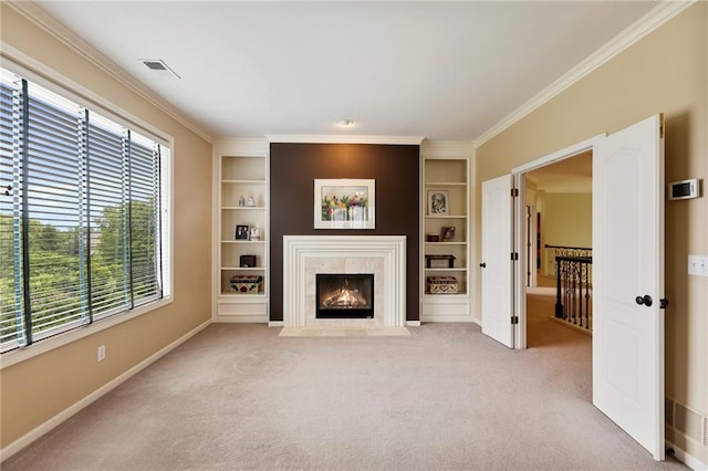 5716 W 146th St, Overland Park, KS 66223 - unfurnished living room with ornamental molding, built in shelves, carpet floors, and a fireplace