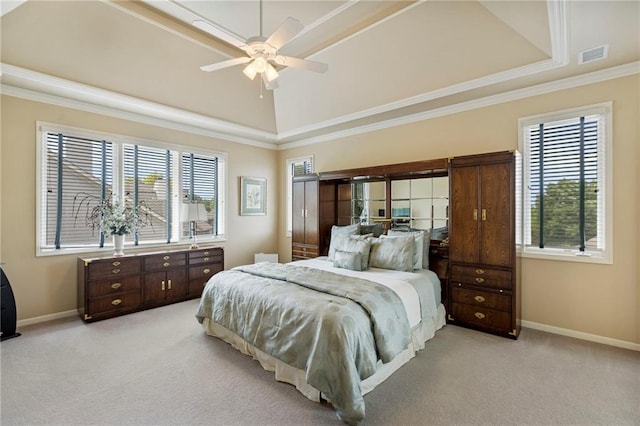 5716 W 146th St, Overland Park, KS 66223 - bedroom featuring a raised ceiling, multiple windows, light carpet, crown molding, and ceiling fan
