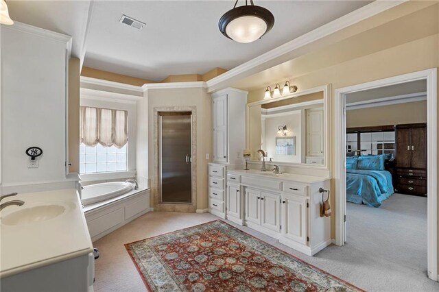 5716 W 146th St, Overland Park, KS 66223 - ensuite bathroom with vanity, a bath, and a shower stall