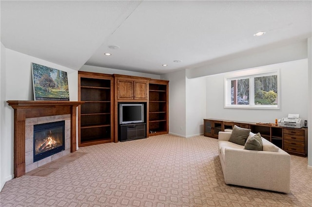 5716 W 146th St, Overland Park, KS 66223 - living area with recessed lighting, a fireplace, and light carpet