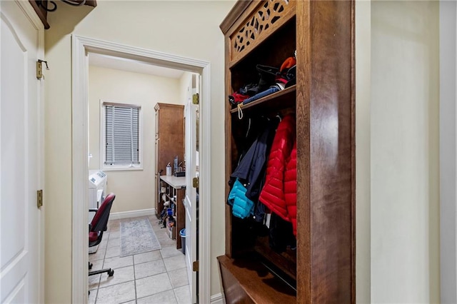 5716 W 146th St, Overland Park, KS 66223 - mudroom with light tile patterned floors and baseboards