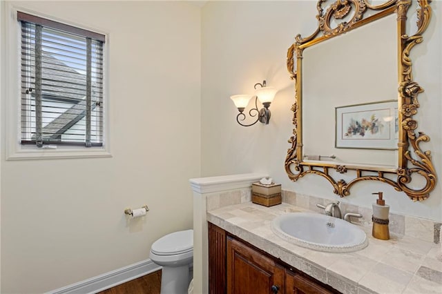 5716 W 146th St, Overland Park, KS 66223 - bathroom featuring vanity and wood finished floors