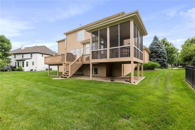 5716 W 146th St, Overland Park, KS 66223 - rear view of property with stairway, a sunroom, stucco siding, and a lawn