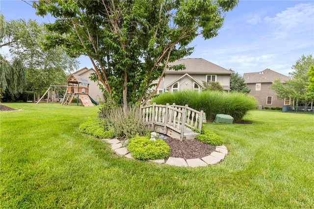 5716 W 146th St, Overland Park, KS 66223 - view of grassy yard with a playground
