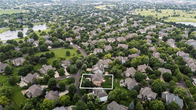 5716 W 146th St, Overland Park, KS 66223 - aerial perspective of suburban area featuring a nearby body of water and property parcel outlined