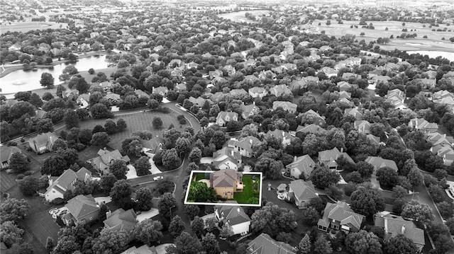 5716 W 146th St, Overland Park, KS 66223 - aerial perspective of suburban area featuring a large body of water and property parcel outlined