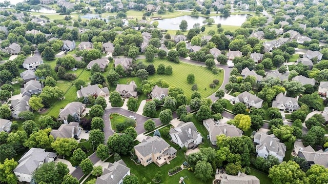 5716 W 146th St, Overland Park, KS 66223 - aerial perspective of suburban area featuring a nearby body of water