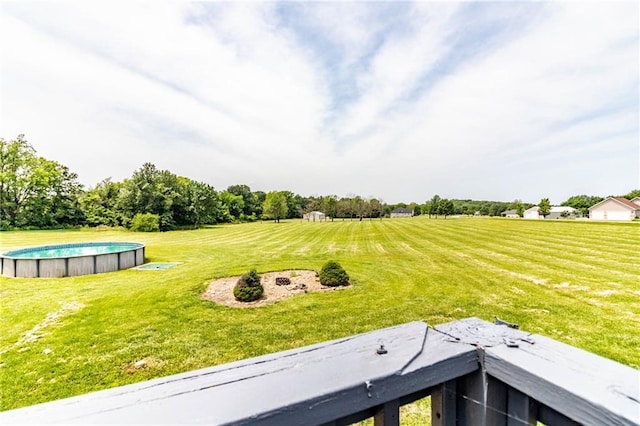 198 SE 455th Rd, Warrensburg, MO 64093 - view of grassy yard featuring an outdoor pool and a view of rural / pastoral area