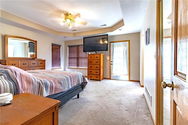 198 SE 455th Rd, Warrensburg, MO 64093 - bedroom with light carpet and a raised ceiling