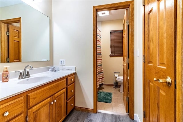 198 SE 455th Rd, Warrensburg, MO 64093 - full bathroom featuring vanity, wood finished floors, and a shower with curtain