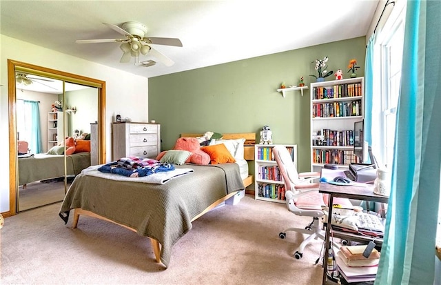 198 SE 455th Rd, Warrensburg, MO 64093 - bedroom featuring carpet flooring, a closet, and a ceiling fan