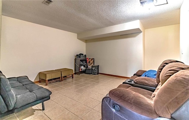 198 SE 455th Rd, Warrensburg, MO 64093 - living area featuring light tile patterned flooring and a textured ceiling