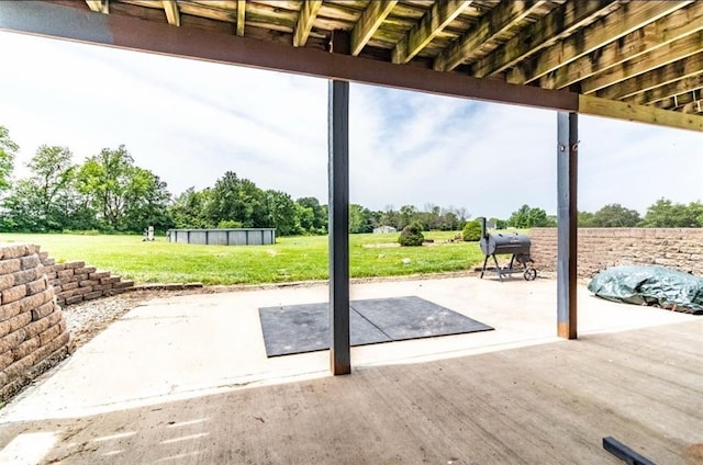 198 SE 455th Rd, Warrensburg, MO 64093 - view of patio featuring a grill and view of scattered trees