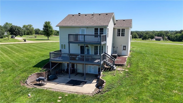 198 SE 455th Rd, Warrensburg, MO 64093 - rear view of property featuring a patio area, a yard, a shingled roof, and a wooden deck