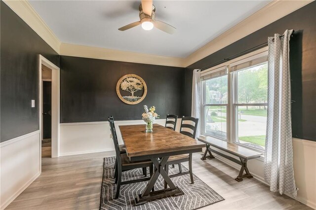 617 Butternut Ln, Liberty, MO 64068 - dining area with ornamental molding, wood finished floors, and ceiling fan