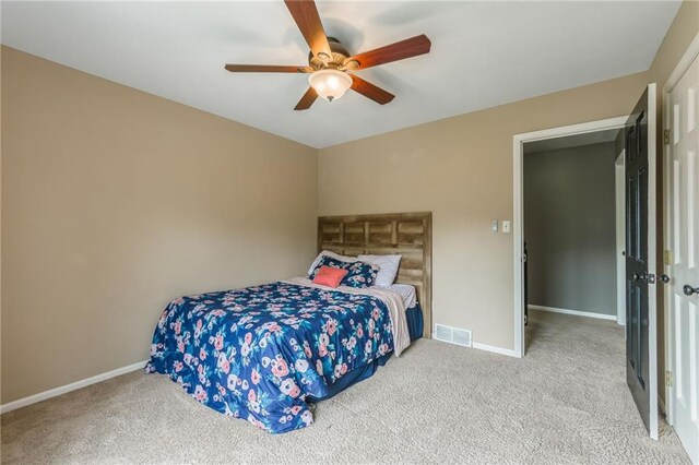 617 Butternut Ln, Liberty, MO 64068 - bedroom with carpet flooring and ceiling fan