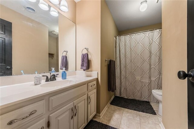 617 Butternut Ln, Liberty, MO 64068 - bathroom with vanity, tile patterned floors, and a shower with shower curtain