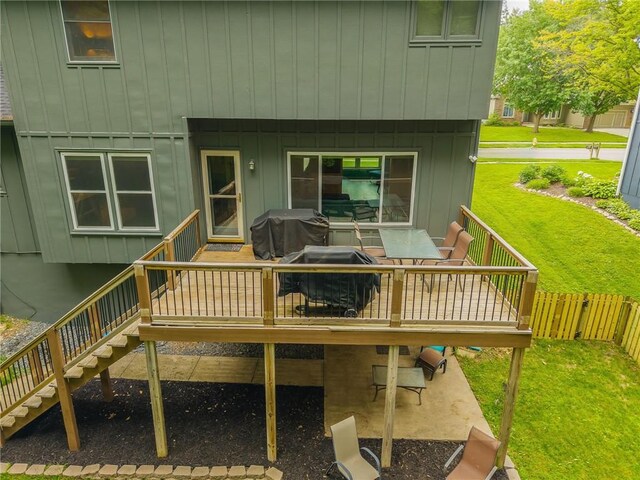 617 Butternut Ln, Liberty, MO 64068 - wooden deck featuring stairway, grilling area, and outdoor dining area