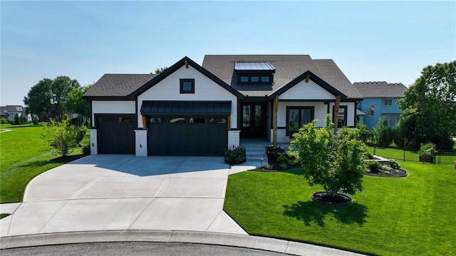 17316 Noland St, Overland Park, KS 66221 - view of front facade with a garage, concrete driveway, a front yard, and french doors