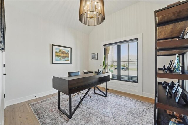 17316 Noland St, Overland Park, KS 66221 - office space with a chandelier, wood finished floors, and high vaulted ceiling