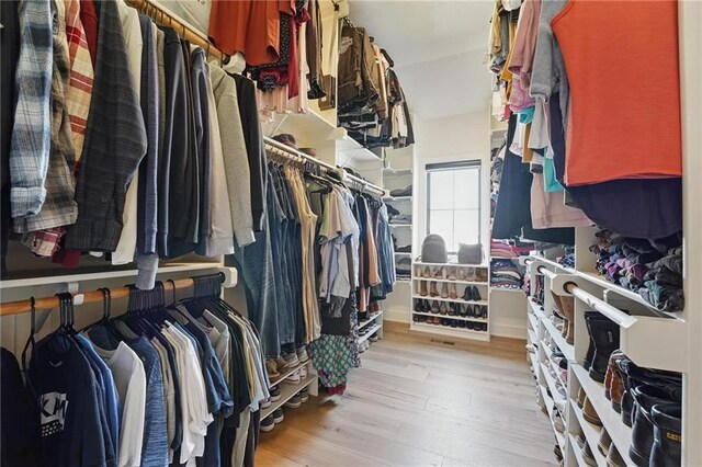17316 Noland St, Overland Park, KS 66221 - walk in closet with light wood finished floors