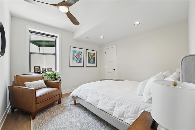 17316 Noland St, Overland Park, KS 66221 - bedroom with wood finished floors, recessed lighting, and a ceiling fan