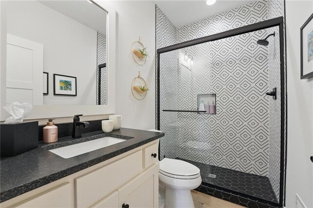 17316 Noland St, Overland Park, KS 66221 - bathroom with vanity and a stall shower