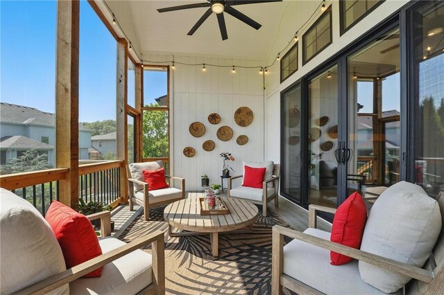 17316 Noland St, Overland Park, KS 66221 - sunroom / solarium featuring ceiling fan and an outdoor living space