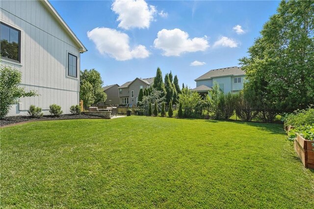 17316 Noland St, Overland Park, KS 66221 - view of yard featuring a residential view