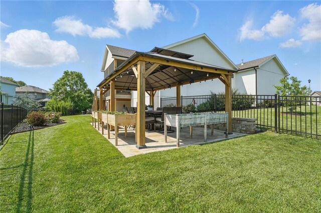 17316 Noland St, Overland Park, KS 66221 - fenced backyard featuring a gazebo and a patio