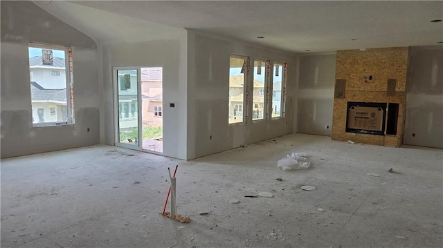 12400 W 184th St, Overland Park, KS 66013 - unfurnished living room featuring a fireplace