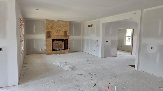 12400 W 184th St, Overland Park, KS 66013 - unfurnished living room with a fireplace