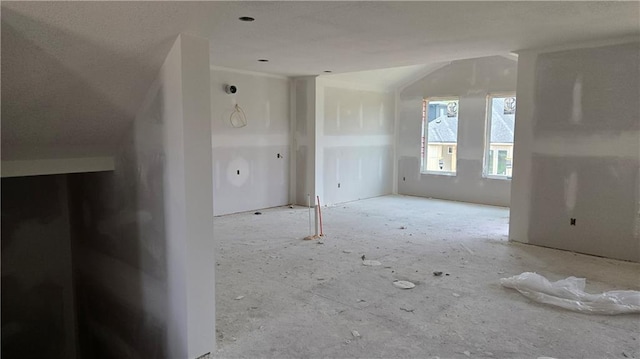 12400 W 184th St, Overland Park, KS 66013 - unfurnished living room featuring vaulted ceiling