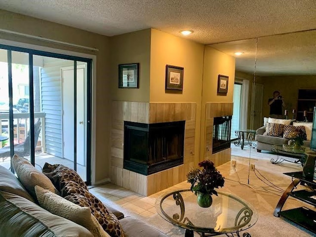8806 W 106th Ter, Overland Park, KS 66212 - living room featuring a multi sided fireplace and a textured ceiling