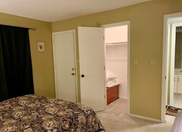 8806 W 106th Ter, Overland Park, KS 66212 - bedroom with light carpet and a closet