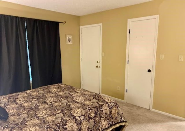 8806 W 106th Ter, Overland Park, KS 66212 - bedroom with carpet flooring and baseboards