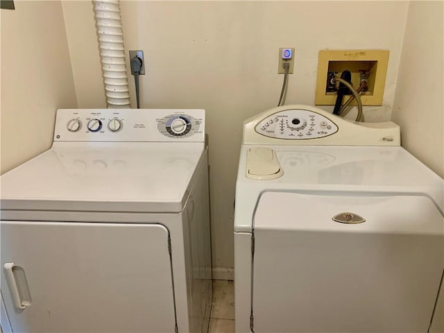 8806 W 106th Ter, Overland Park, KS 66212 - laundry room featuring separate washer and dryer