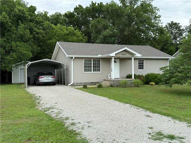 1003 S Ridgeway St, Caney, KS 67333 - ranch-style house with driveway, a carport, a front yard, and a shingled roof