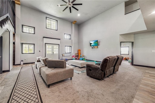 9414 Greenton Rd, Odessa, MO 64076 - living area featuring a high ceiling, light wood finished floors, ceiling fan, and recessed lighting