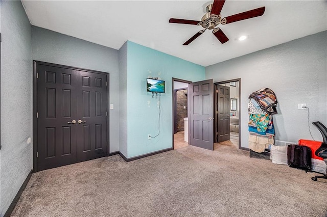 9414 Greenton Rd, Odessa, MO 64076 - bedroom featuring light colored carpet, ceiling fan, and a closet